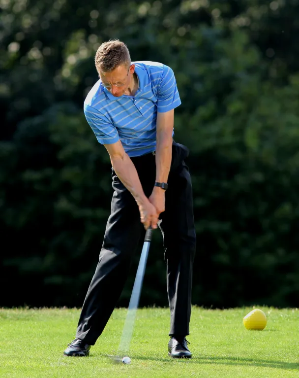 Richtiger Treffmoment im Golf.